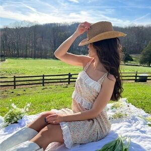 Brand new with tags floral mini dress. Button in back. Smoke free home